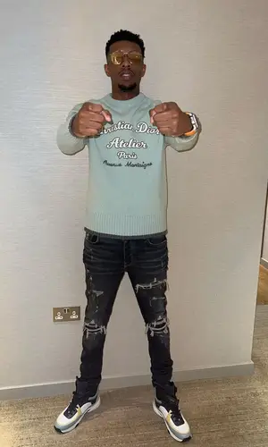 MoStack wearing Amiri jeans