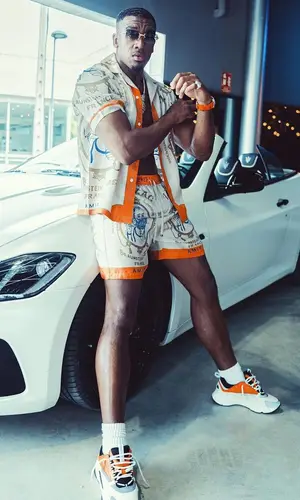Bugzy Malone wearing Amiri shorts