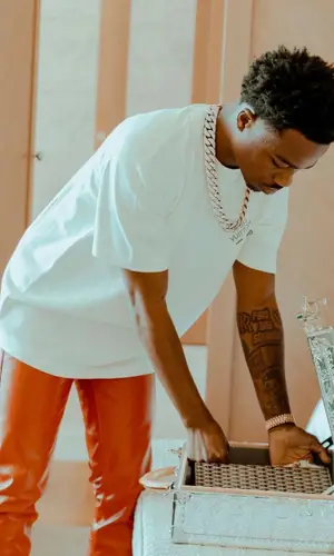 Roddy Ricch wearing Louis Vuitton sneakers
