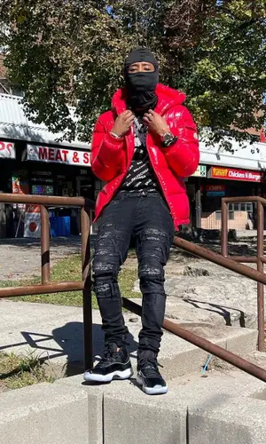 Pressa wearing Amiri jeans