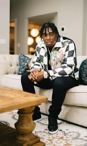 Fredo Bang wearing Amiri jeans