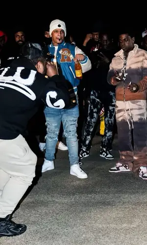 Doodie Lo’s Outfit in Rhude Jacket, Amiri Jeans & Nike Sneakers (2022)