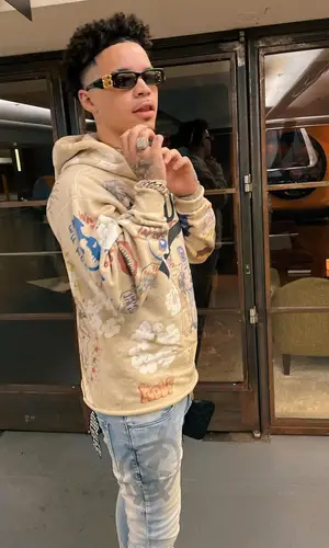 Lil Mosey wearing Denim Tears hoody