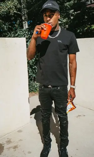 NBA YoungBoy wearing Celine belt