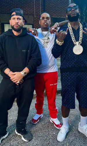 DJ Drama’s Outfit in Fear of God Hoodie & Nike Sneakers (2022)