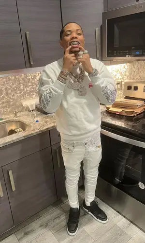 Lil Migo wearing Chrome Hearts sweatshirt