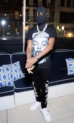 Lil Tjay wearing Yeezy eyewear
