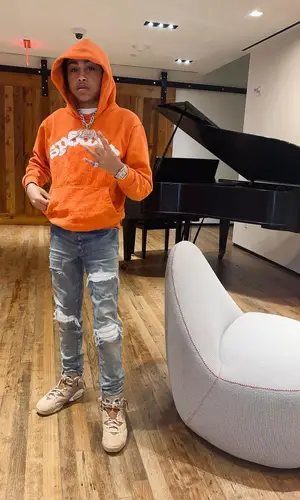 Stunna Gambino’s Outfit in Spider Worldwide Hoodie, Amiri Jeans & Balenciaga Eyewear (2022)