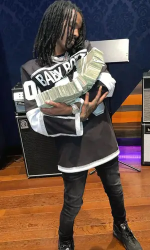 Baby Smoove’s Outfit in Purple Brand Jeans, Jordan Sneakers & Alexander McQueen Socks (2022)
