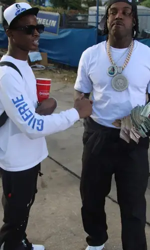 Lil Double 0 wearing Supreme cap