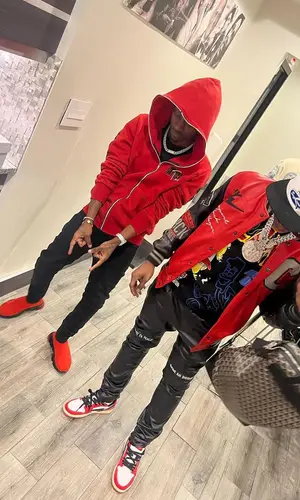 Lil Double 0 wearing Supreme cap