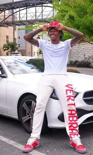 Duke Dennis wearing Vertabrae pants