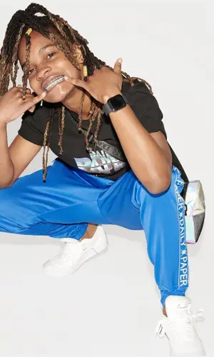 Koffee wearing Daily Paper bag