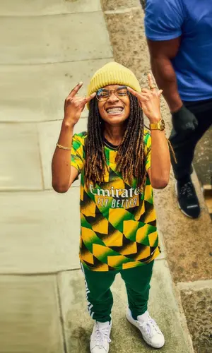 Koffee wearing Stadium Goods hat