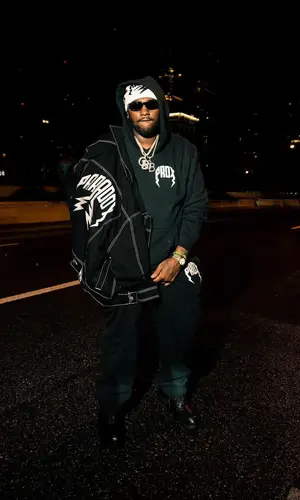 Peezy wearing Paradox suit
