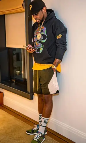 Fabolous wearing New Era cap