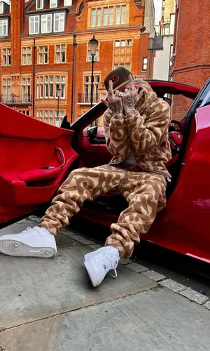 Millyz wearing New Era cap