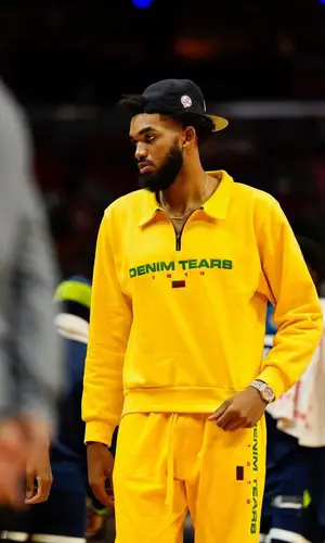 Karl Anthony Towns wearing Denim Tears pants