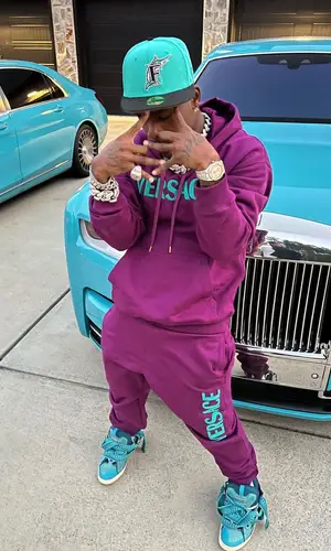 DaBaby wearing Versace hoody
