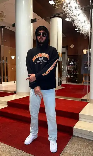 Kalim wearing Celine eyewear