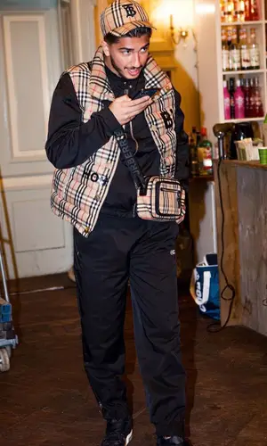 Mero wearing Burberry cap