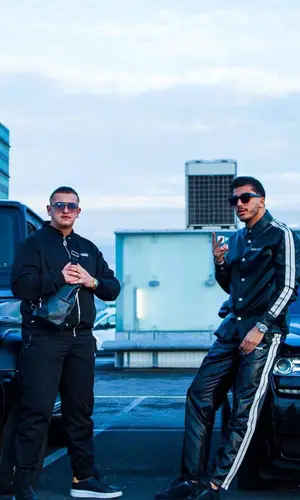 Mero wearing Palm Angels pants
