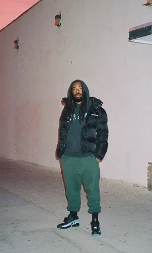 DRAM wearing Nike sneakers