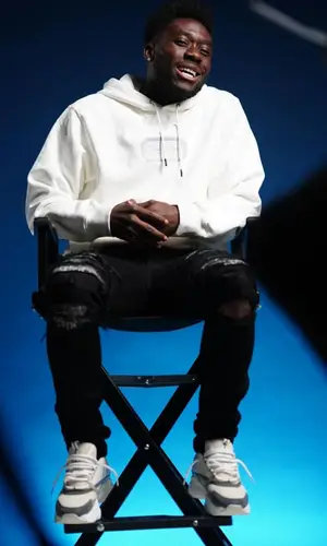 Alphonso Davies wearing Dior sneakers