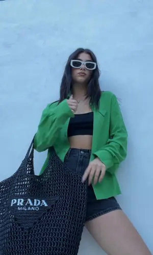 Charli D'Amelio wearing Prada shirt
