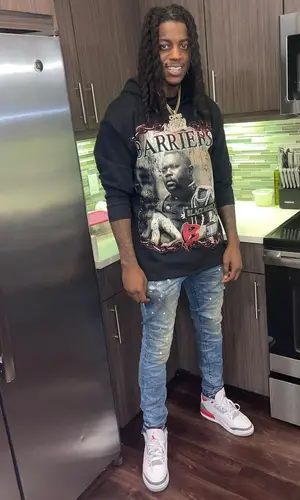 OMB Peezy’s Outfit in Barriers Hoodie, Purple Brand Jeans & Jordan Sneakers (2022)
