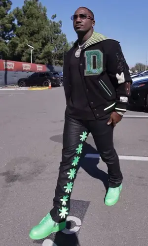 Deebo Samuel wearing Cactus Jack jacket