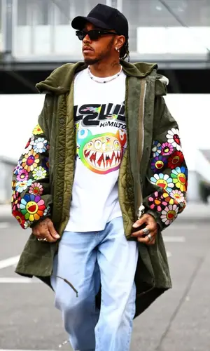Lewis Hamilton’s Outfit in Takashi Murakami Jacket, Nanushka Eyewear & Readymade (2022)