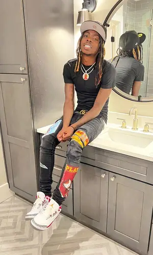 Dee Watkins wearing Gucci belt