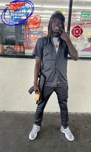 Dee Watkins wearing Dickies shirt