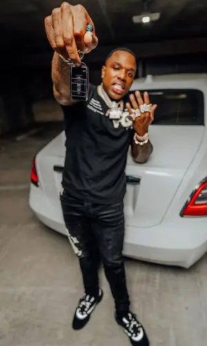 BandMan Kevo wearing Amiri jeans
