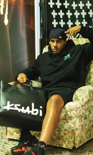 AJ Tracey wearing Ksubi bag