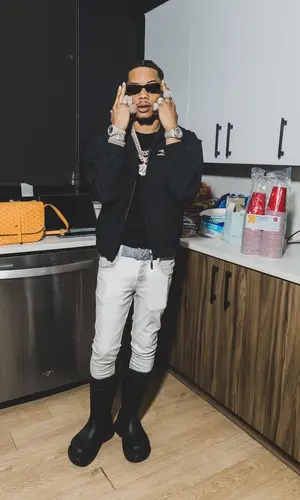 Lil Migo wearing Balenciaga boots