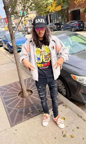 BabyTron wearing Bape cap