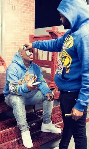 Doodie Lo’s Outfit in Ricchezza Forever Hoodie, Amiri Jeans & Nike Sneakers (2022)