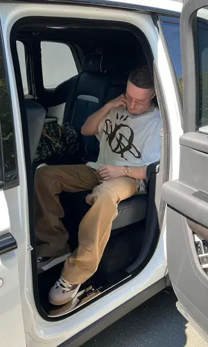 Justin wearing Cactus Jack sneakers