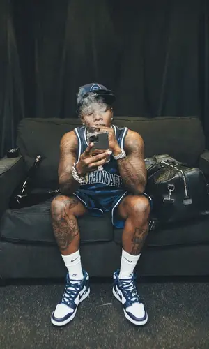 DaBaby wearing Nike sneakers