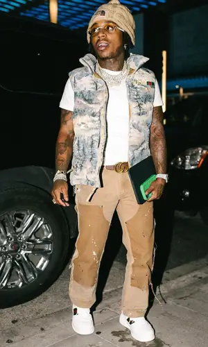 Jacquees wearing Gucci belt