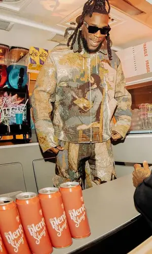 Burna Boy wearing Louis Vuitton sneakers