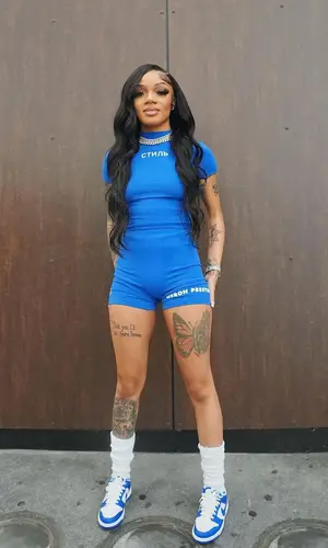 GloRilla’s Outfit in Heron Preston T-Shirt & Nike Sneakers (2022)