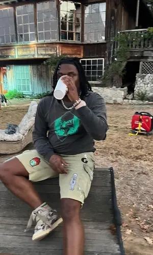 Lucki wearing Gallery Dept. shorts