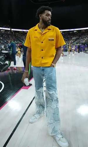 Karl Anthony Towns wearing Gallery Dept. shirt