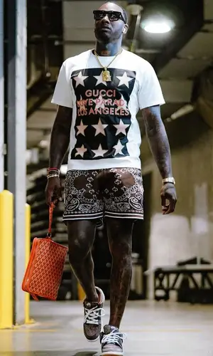 John Wall’s Outfit in Gucci T-Shirt, Amiri Shorts & Nike Sneakers (2022)