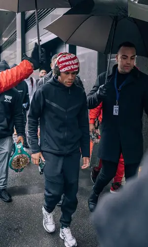 Devin Haney wearing Nike pants