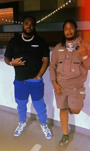 Tee Grizzley wearing Jordan sneakers