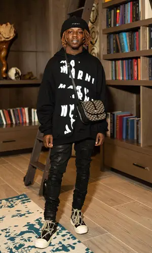 Jackboy wearing Goyard bag